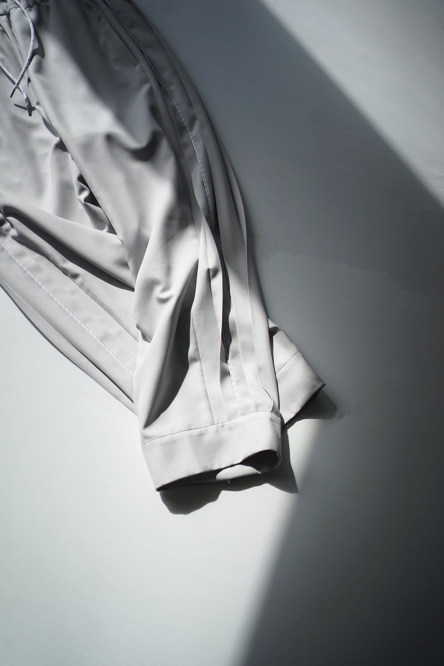 itochi / Polyester Linon pleated track pants